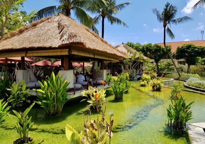 The huge resort gardens feature several ponds and lawns.