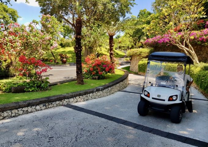 The vast resort grounds require golf buggies to get around.