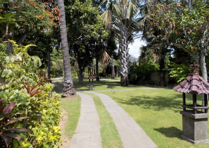 The villas are spread out among the resort gardens and have paths connecting them.