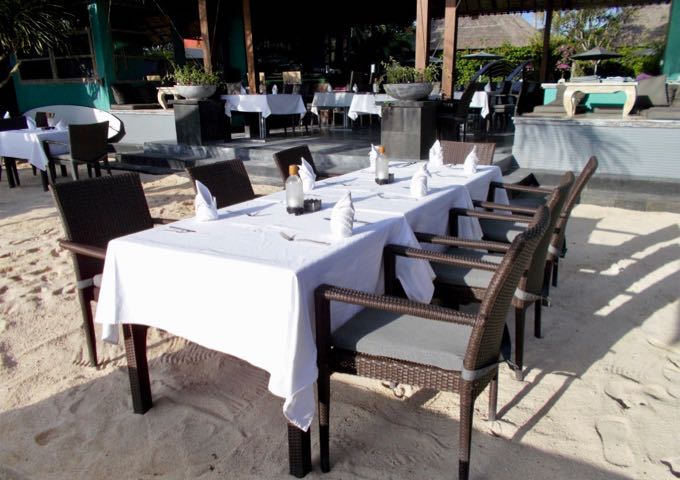 The beachside restaurant offers fine dining on the sand.
