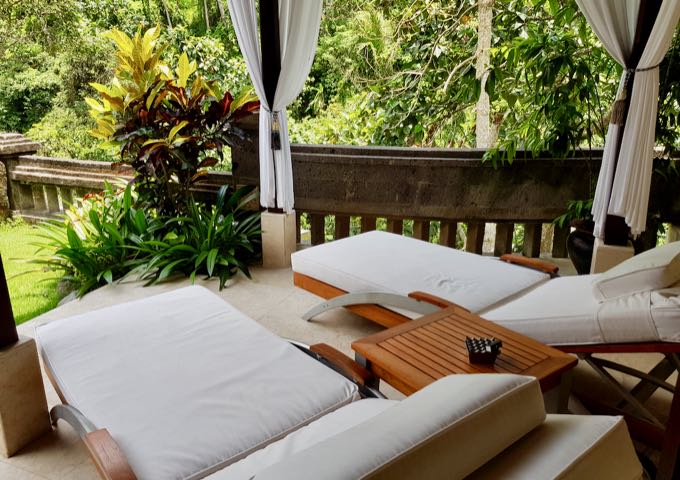 The spacious outdoor areas features a lot of comfortable furniture.
