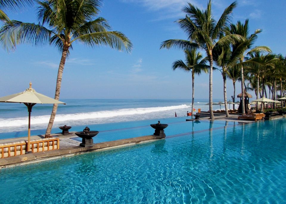 Beach resort and infinity pool in Seminyak, Bali.