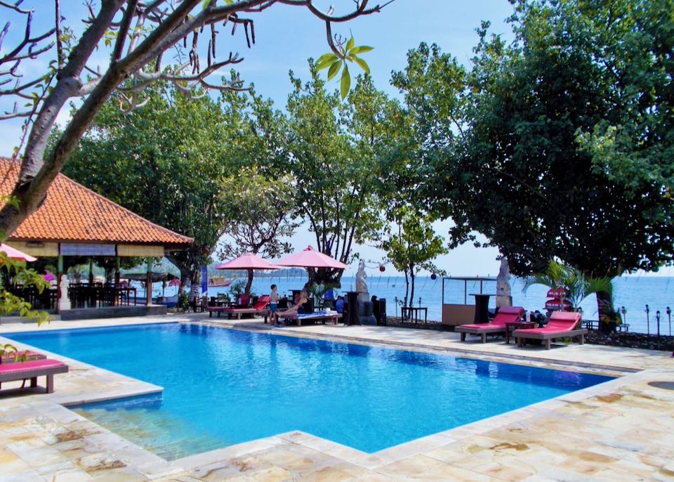 Beachfront hotel pool in Bali.