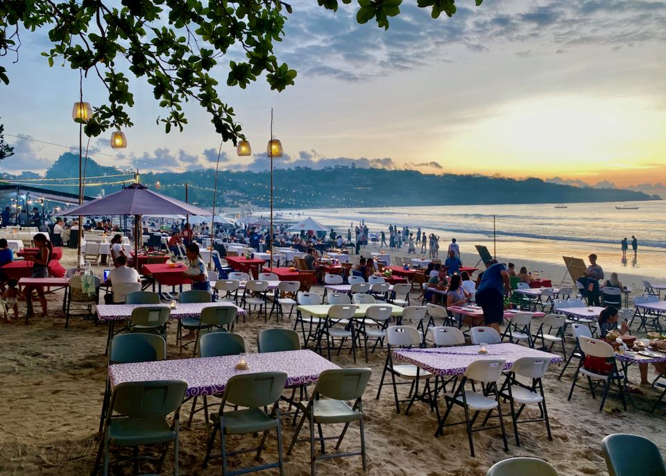Sunset at Jimbaran Beach in Bali.