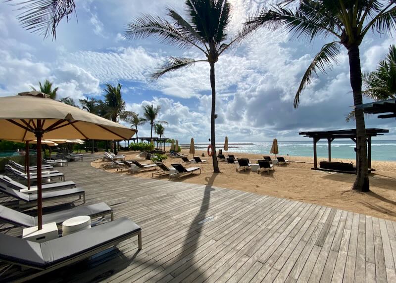 The boardwalk is filled with lounge chairs on the beachfront at the Ritz-Carlton on the Bukit Peninsula in Bali.
