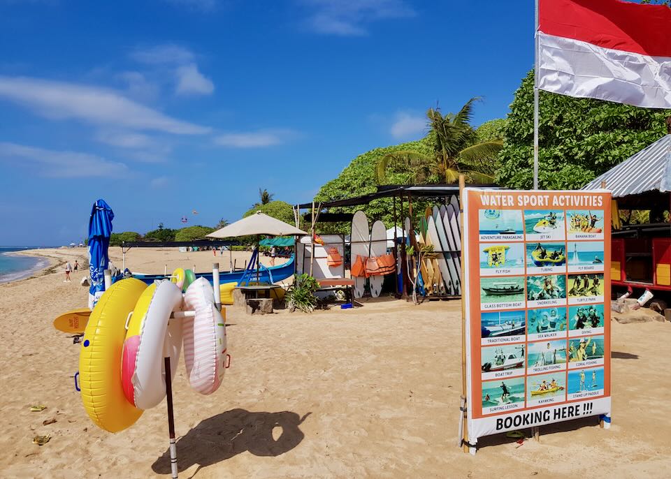 A water sports kiosk on the beach.