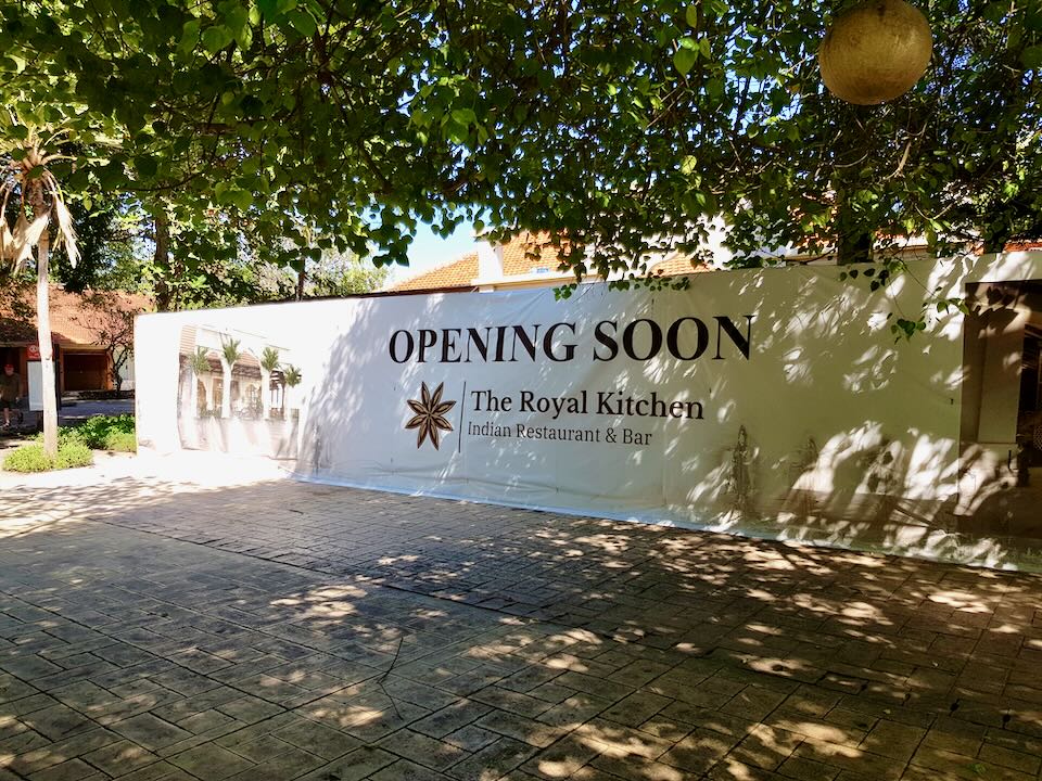 A sign that says Opening Soon.