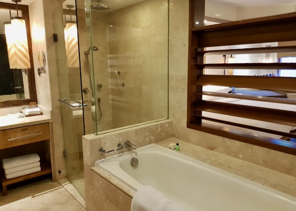 A tub and walk-in shower.