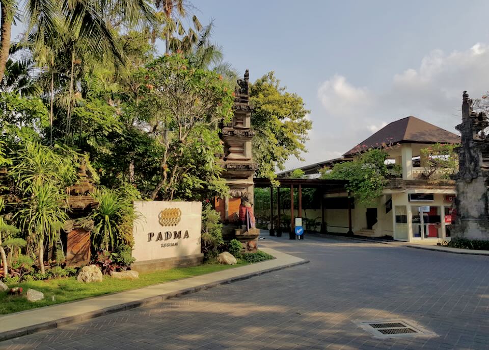 The Padma sign sits outside the resort surrounded by trees.