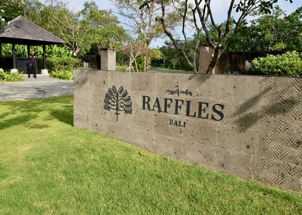A stone sign reads "Raffles Bali"