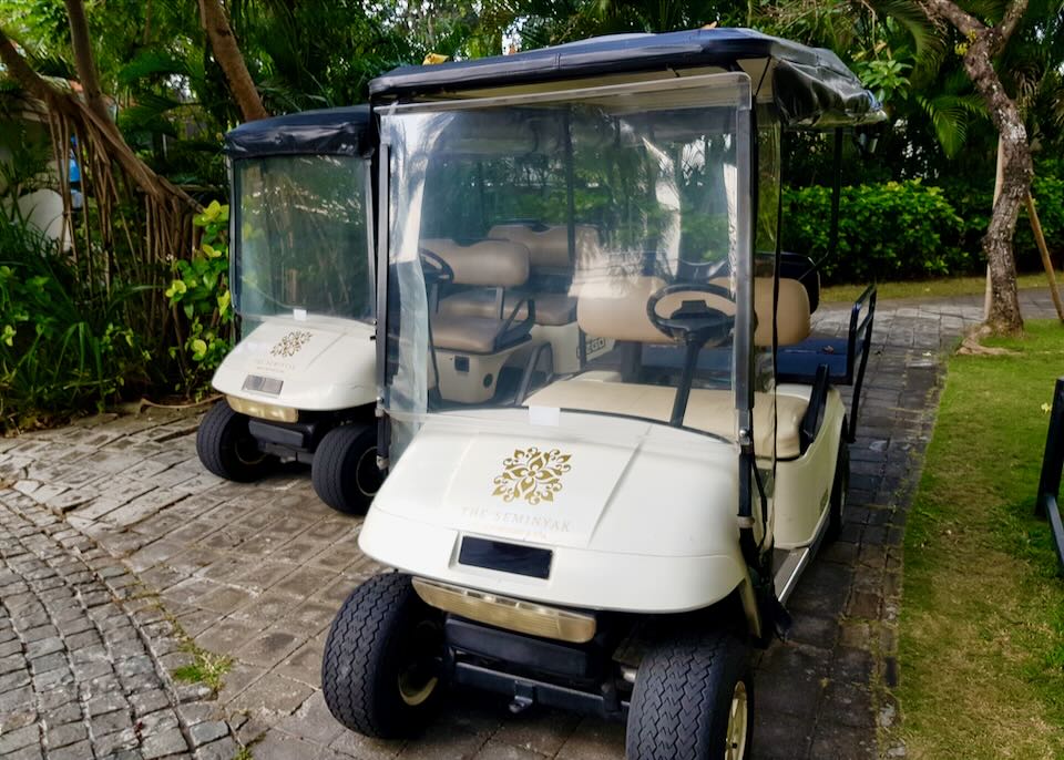 Parked golf carts wait for guests.