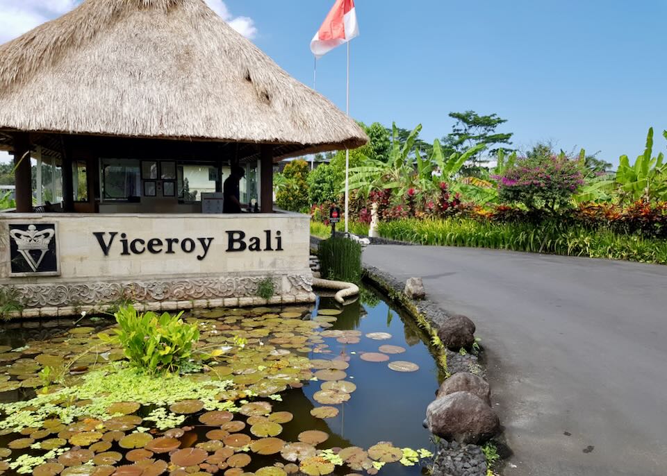 A sign reads, "Viceroy Bali" on an entrance check point.