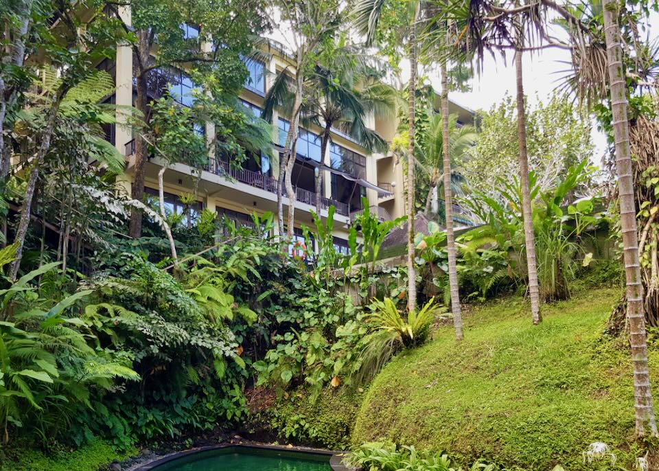 The outside of the Komaneka resort blends in with the tropical forest.
