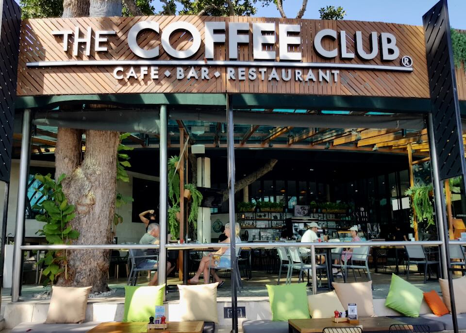 Guests sit outside at The Coffee Club.