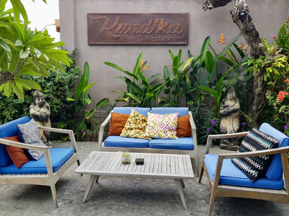An outdoor seating area at The Kundika Bar & Restaurant.