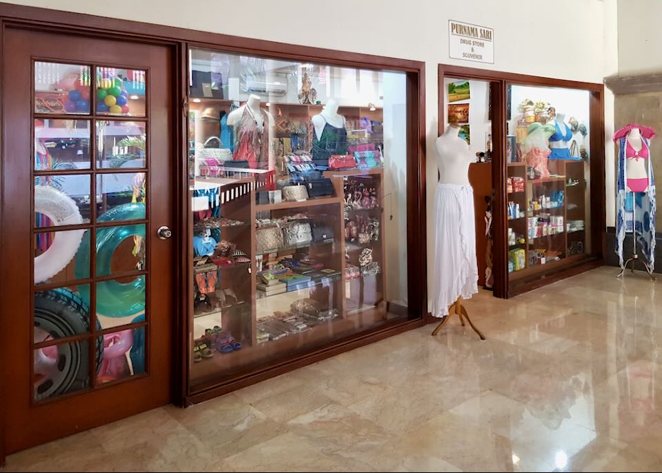 A store window inside the hotel features lots of souvenirs.