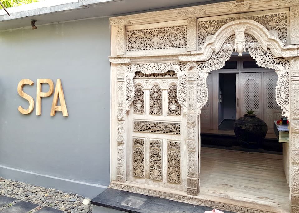 An ornately carved entrance into a spa.