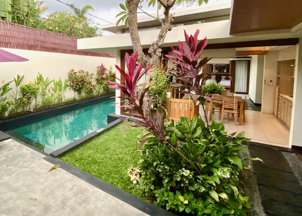 An outdoor sitting area next to the private pool in the villas at Avani Seminyak Bali Resort, in Bali.
